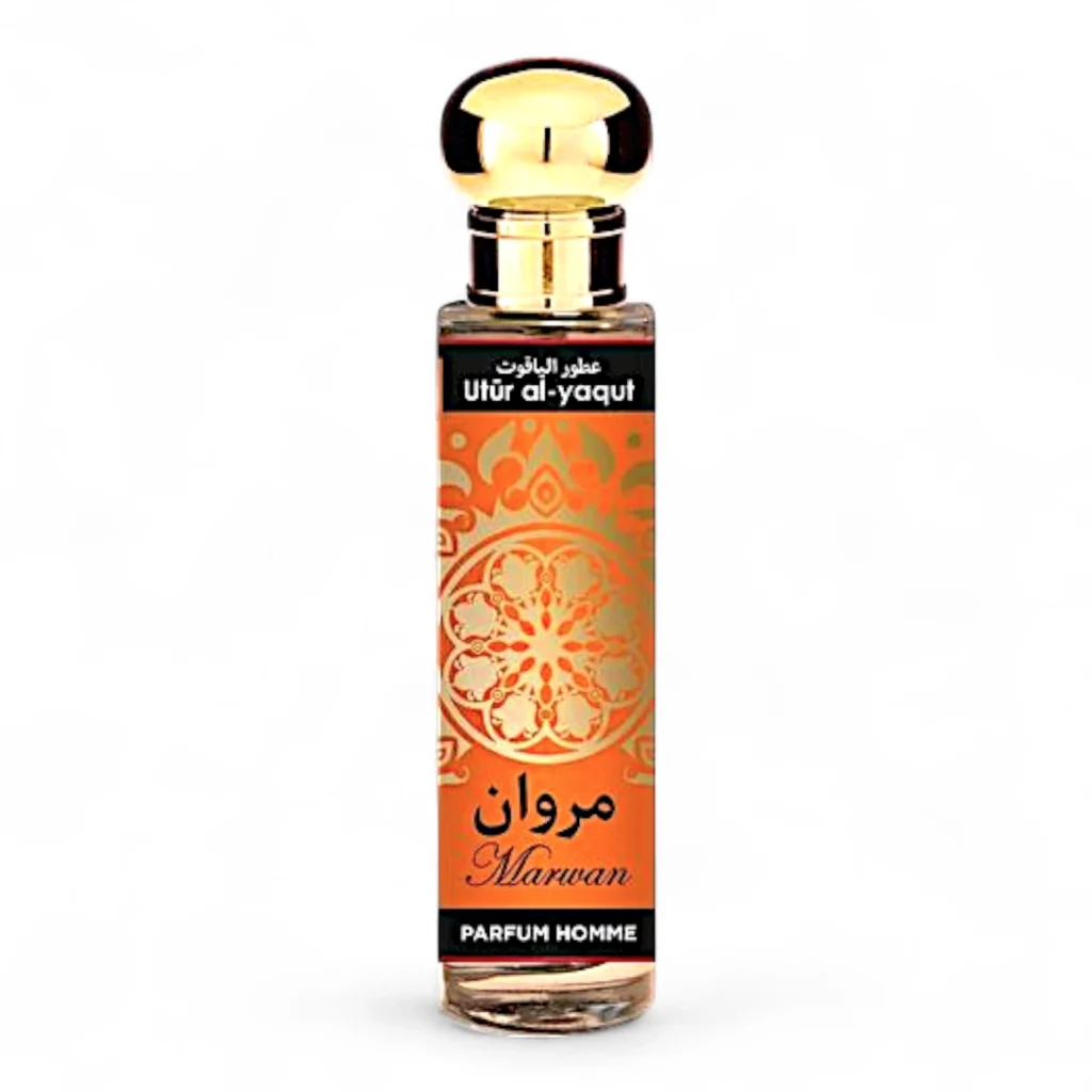 Frasco alto y transparente de 30 ml de Utür al-yaqut Marwan hombre EDP con tapón dorado y etiqueta naranja con caracteres árabes, el nombre Marwan, Parfum Homme y un motivo floral dorado decorativo.
