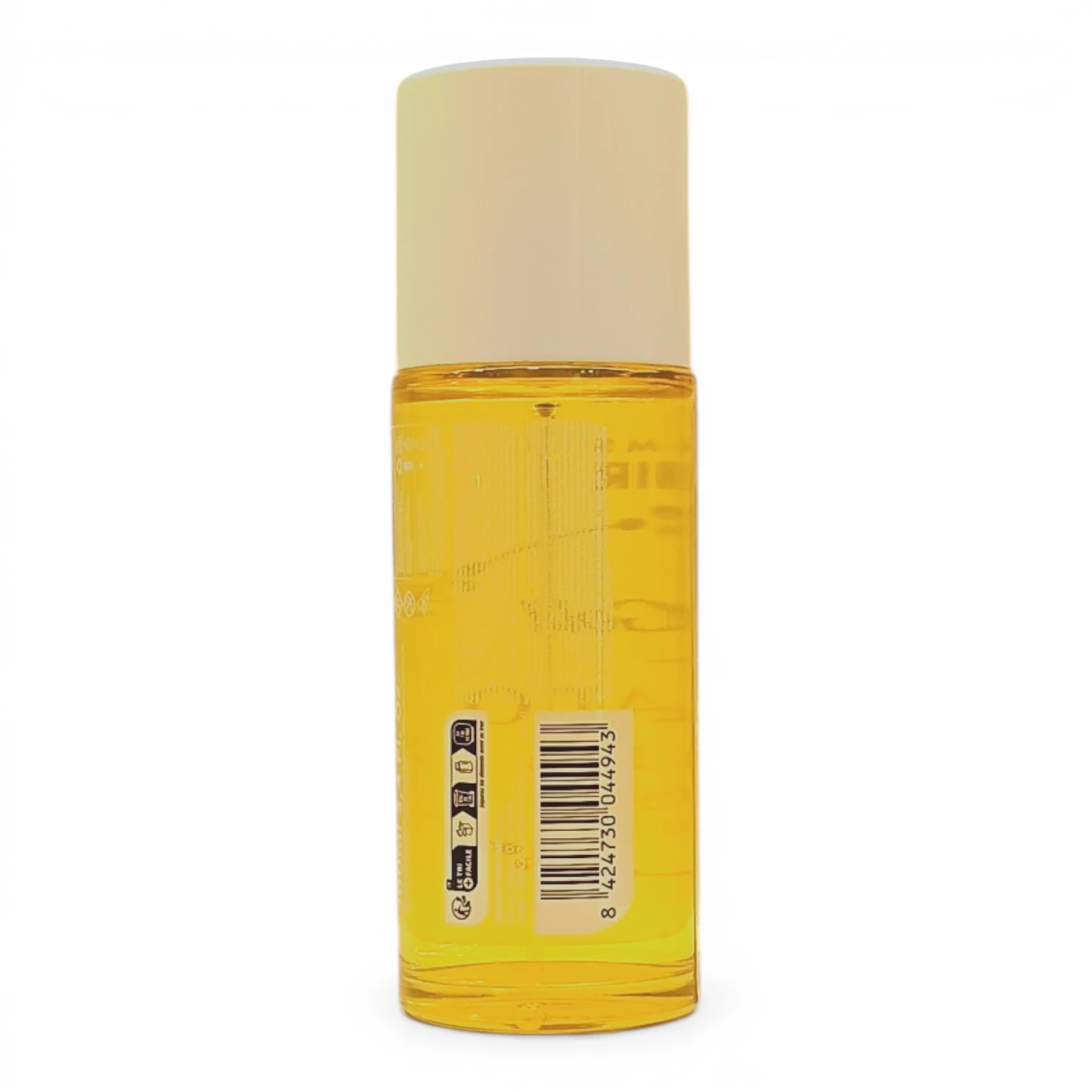 Botella de plástico transparente llena de líquido amarillo, con tapón beige y código de barras visible en la etiqueta. La botella está en posición vertical sobre un fondo blanco liso.